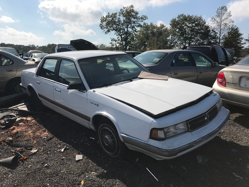 Olds Cutlass Ciera. Didn’t seem to be missing much.